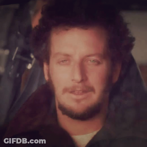 Man With Curly Hair And Beard Smiling GIF