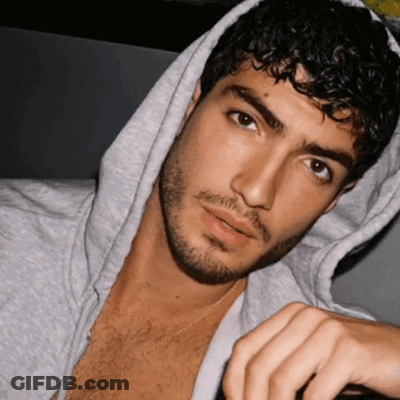 Man With Curly Hair And Beard Wearing Hoodie GIF