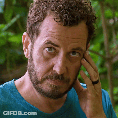 Man With Curly Hair And Beard Wearing Ring GIF