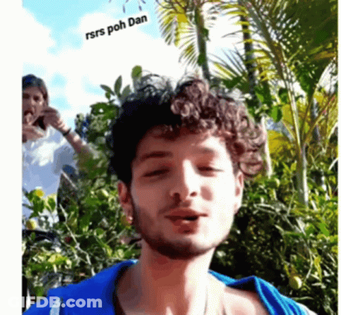 Man With Curly Hair And Blue Shirt Says Rsrs Poh Dan GIF