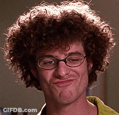 Man With Curly Hair And Glasses Making A Face GIF