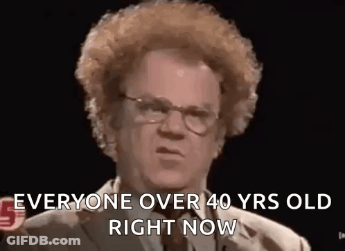 Man With Curly Hair And Glasses Speaking GIF