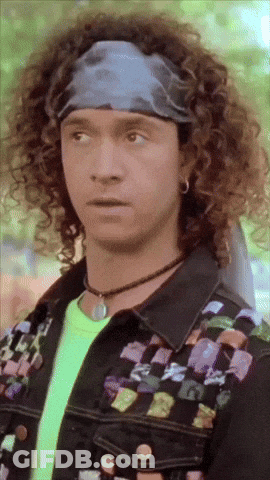 Man With Curly Hair And Neon Shirt GIF