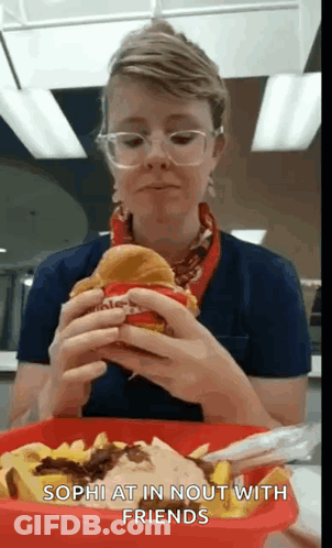 Man With Curly Hair And Pipe Making Funny Face GIF