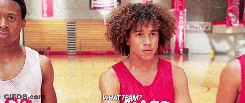 Man With Curly Hair Asking What Team On Basketball Court GIF