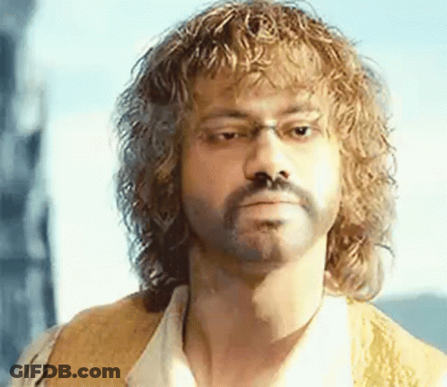 Man With Curly Hair Beard Glasses And Vest GIF