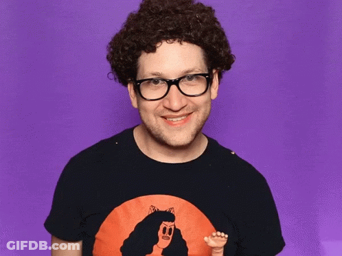 Man With Curly Hair, Glasses, Woman Picture Shirt GIF