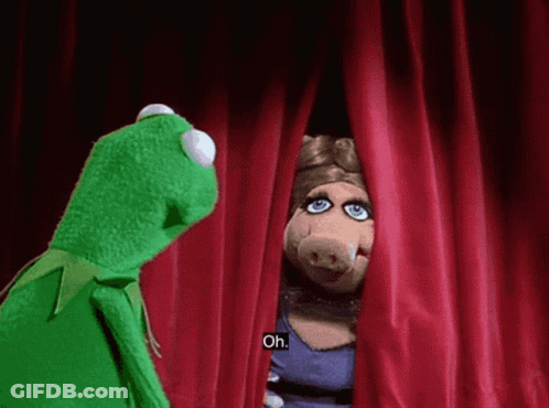 Man With Curly Hair Holding Paper GIF