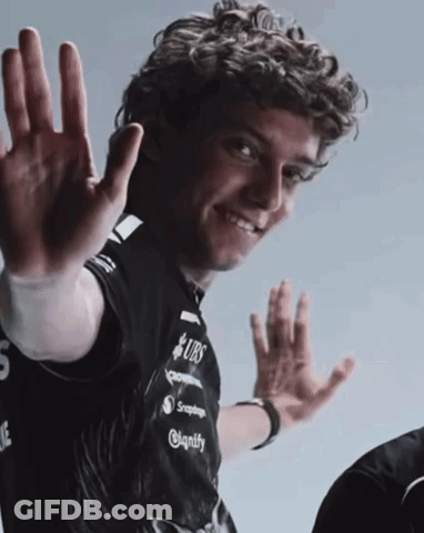 Man With Curly Hair In Black Shirt Saying UBS GIF