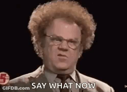 Man With Curly Hair In Glasses And Suit GIF