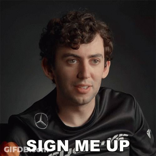 Man With Curly Hair In Sign Me Up Shirt GIF