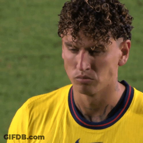 Man With Curly Hair In Yellow Nike Shirt GIF