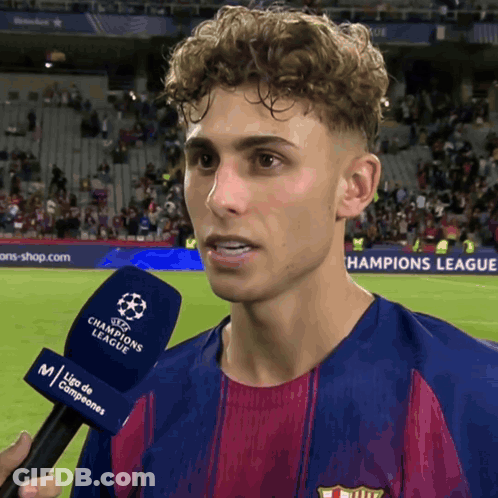 Man With Curly Hair Interviewed Champions League Microphone GIF