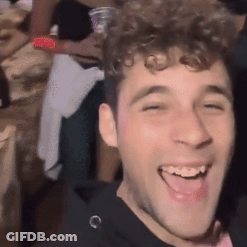 Man With Curly Hair Laughing GIF
