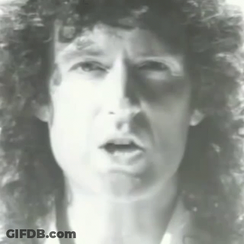 Man With Curly Hair Making A Face GIF