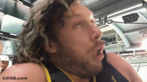 Man With Curly Hair Making Funny Face GIF