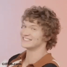 Man With Curly Hair Making Funny Face GIF