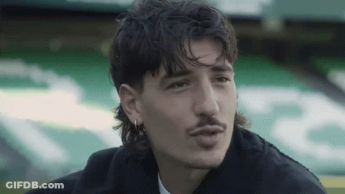 Man With Curly Hair Mustache And Earrings GIF