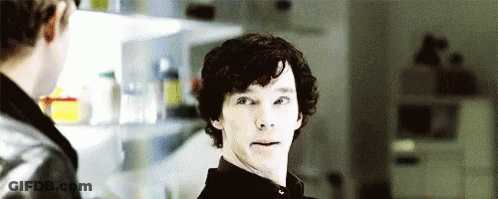 Man With Curly Hair Next To Man In Kitchen GIF
