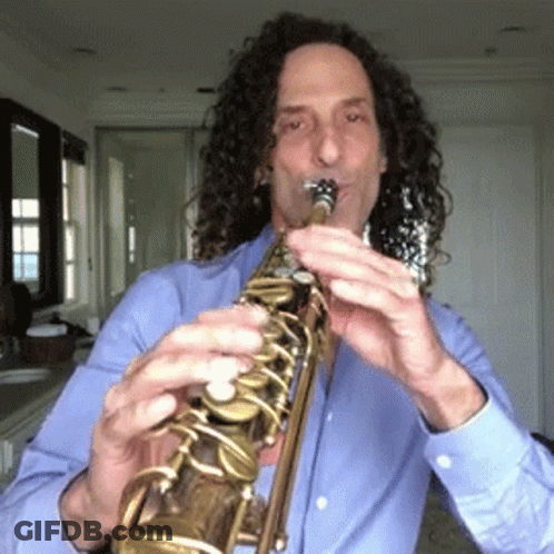 Man With Curly Hair Playing Saxophone GIF