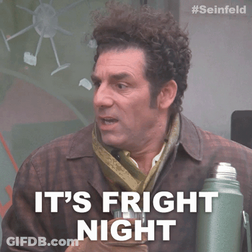 Man With Curly Hair Says It's Fright Night Holding Thermos GIF