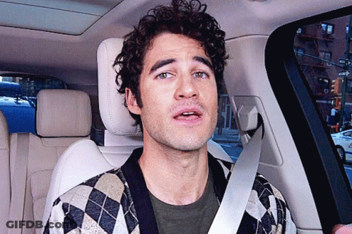 Man With Curly Hair Sitting In Car GIF