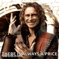 Man With Curly Hair Smiling And Gesturing GIF