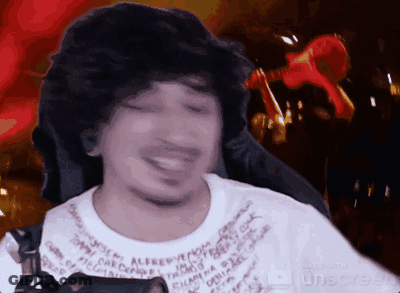 Man With Curly Hair Smiling In Alfred T-Shirt GIF