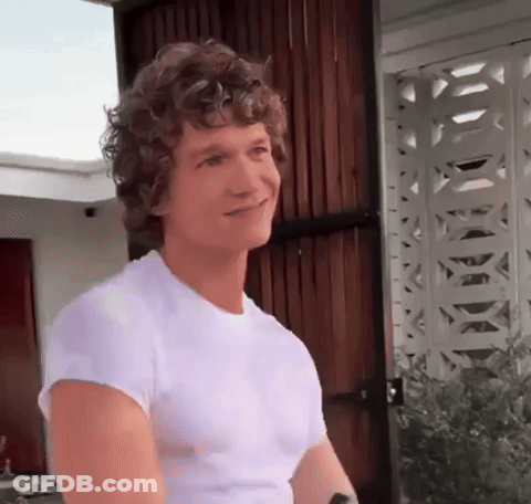 Man With Curly Hair Smiling GIF