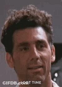 Man With Curly Hair Smiling Saying I Got Time GIF