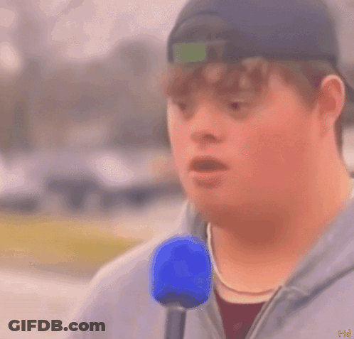 Man With Down Syndrome Holding Blue Microphone Saying Mayonnaise GIF