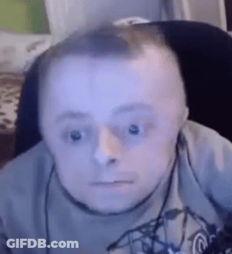 Man With Down Syndrome Wearing Headphones Making Funny Face GIF