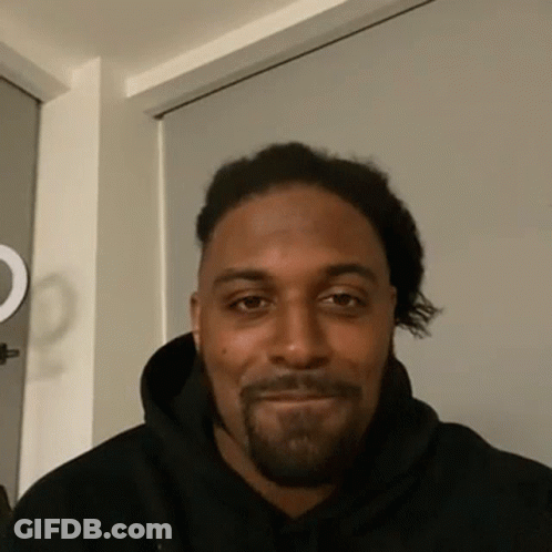Man With Dreadlocks And Beard In Black Hoodie GIF