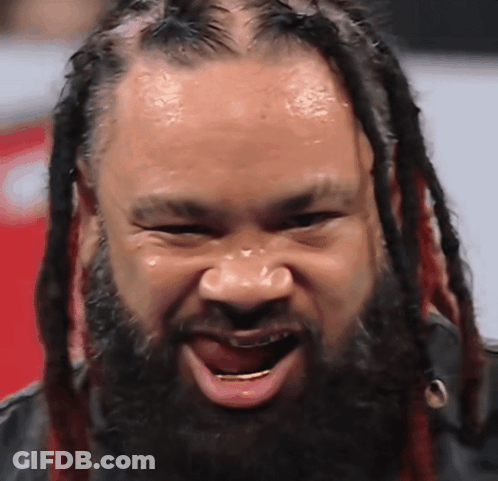 Man With Dreadlocks And Beard Making Funny Face GIF