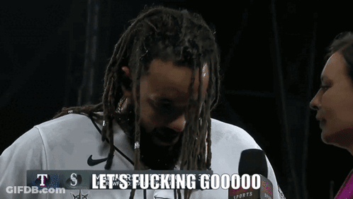 Man With Dreadlocks And Beard Saying Lets Go GIF