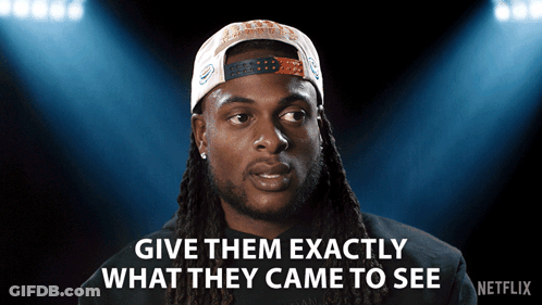 Man With Dreadlocks And Hat Says Give Them Exactly What They Came To See GIF