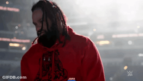 Man With Dreadlocks And JBPD Hoodie GIF