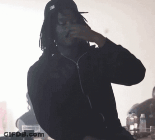 Man With Dreadlocks And MLB Hat GIF