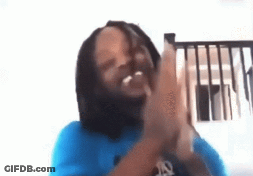 Man With Dreadlocks Clapping Hands GIF
