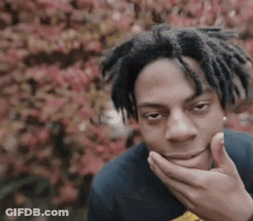 Man With Dreadlocks Covering Face GIF