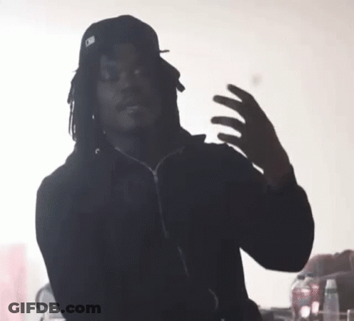 Man With Dreadlocks Dancing In Black GIF