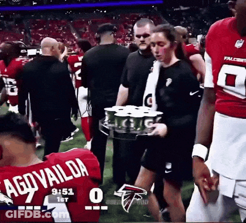 Man With Dreadlocks Holding Another Man's Arm In TikTok Video GIF
