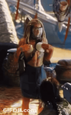 Man With Dreadlocks Holding Plate GIF