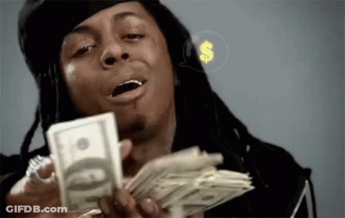 Man With Dreadlocks Holding Stack Of Money GIF