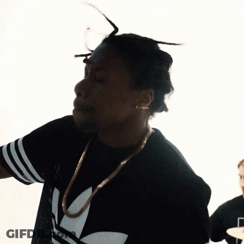 Man With Dreadlocks In Black Adidas Shirt GIF