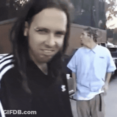 Man With Dreadlocks In Black Adidas Shirt GIF