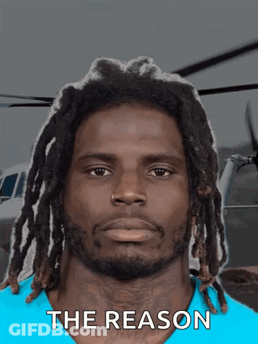 Man With Dreadlocks In Blue Shirt Saying The Reason GIF