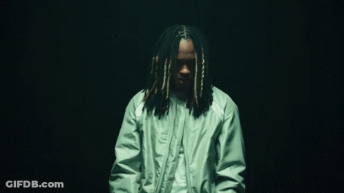 Man With Dreadlocks In Green Jacket And White Shirt GIF
