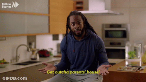 Man With Dreadlocks In Grey Shirt Saying Aight GIF