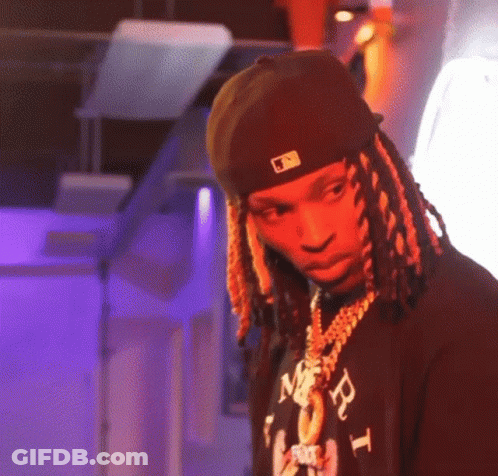 Man With Dreadlocks In Hat And Necklace GIF